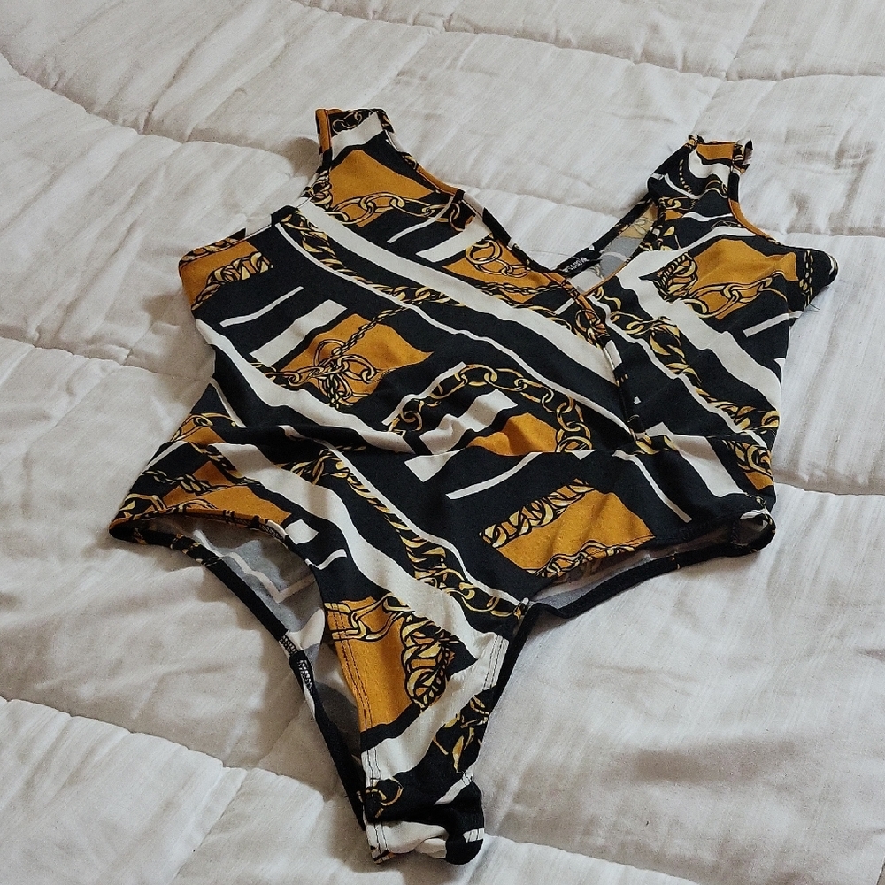 Stylish Black and Gold Patterned Bodysuit